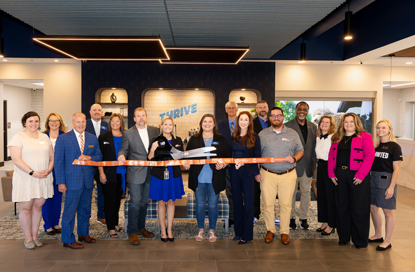 ORNL FCU employees cutting ribbon at Fountain City Branch grand opening