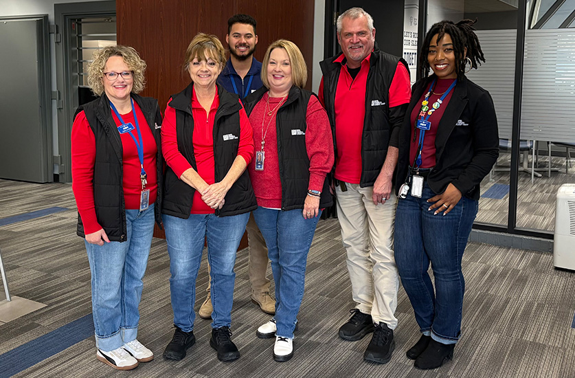 ORNL team members smiling for Wear Red Day